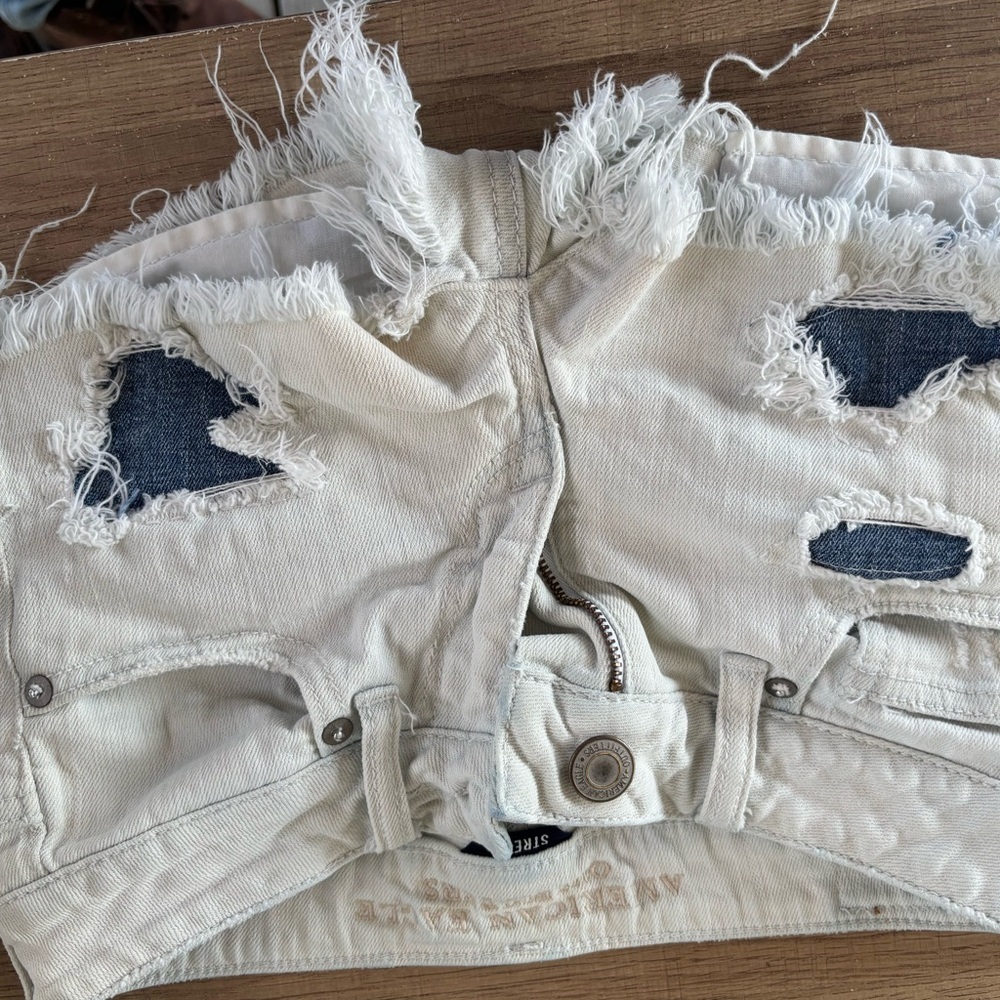 Distressed Cream Denim Shorts